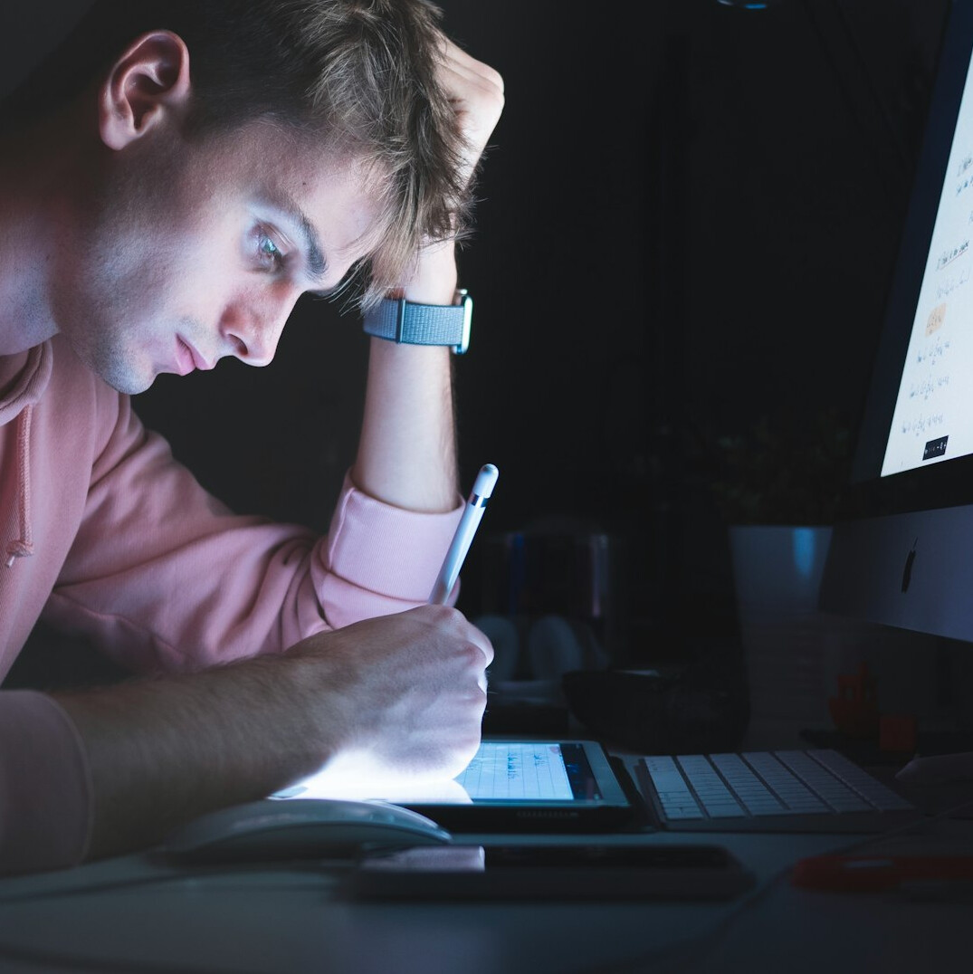 person learning to code on laptop