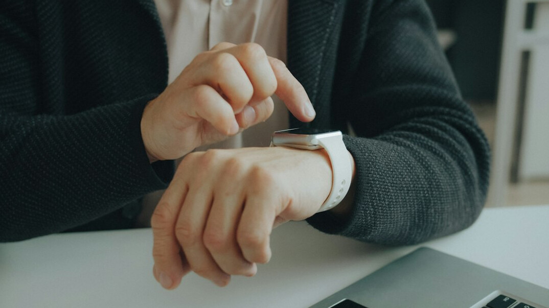 Analyst reviewing product data charts on multiple screens