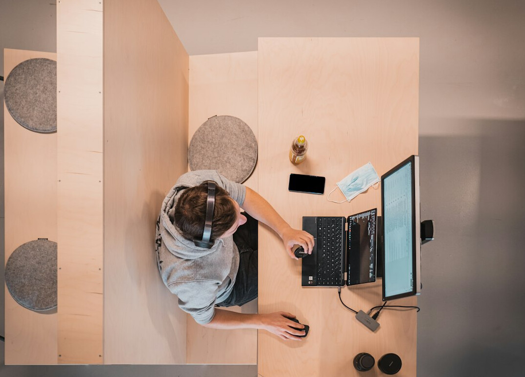 woman coding at home office